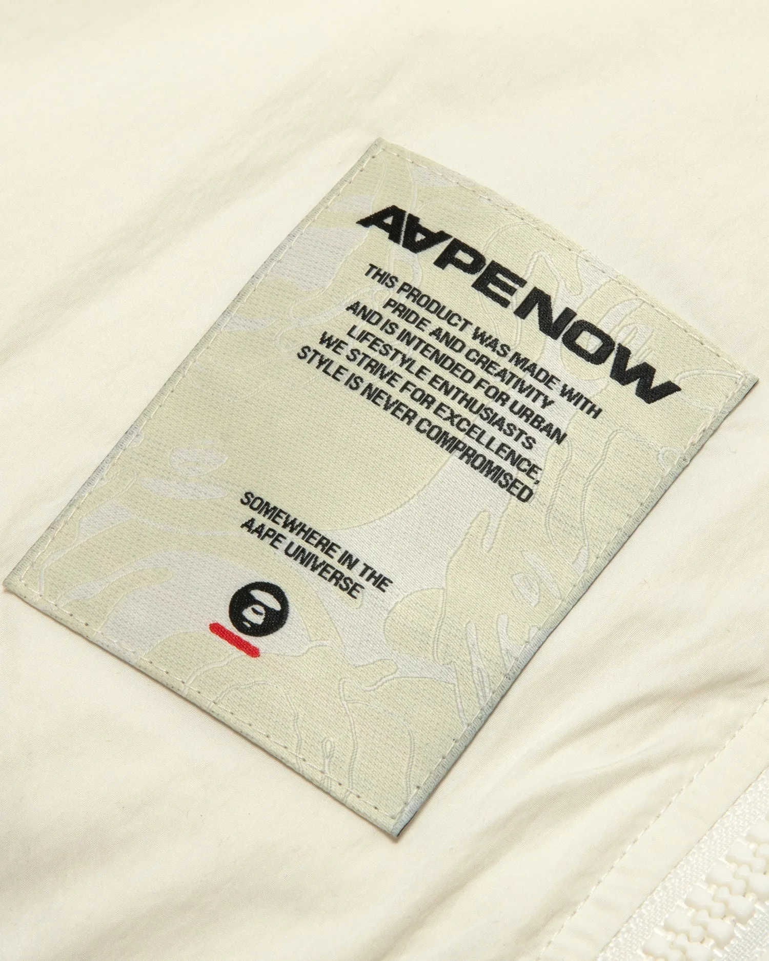 AAPE NOW moonface logo puffer jacket