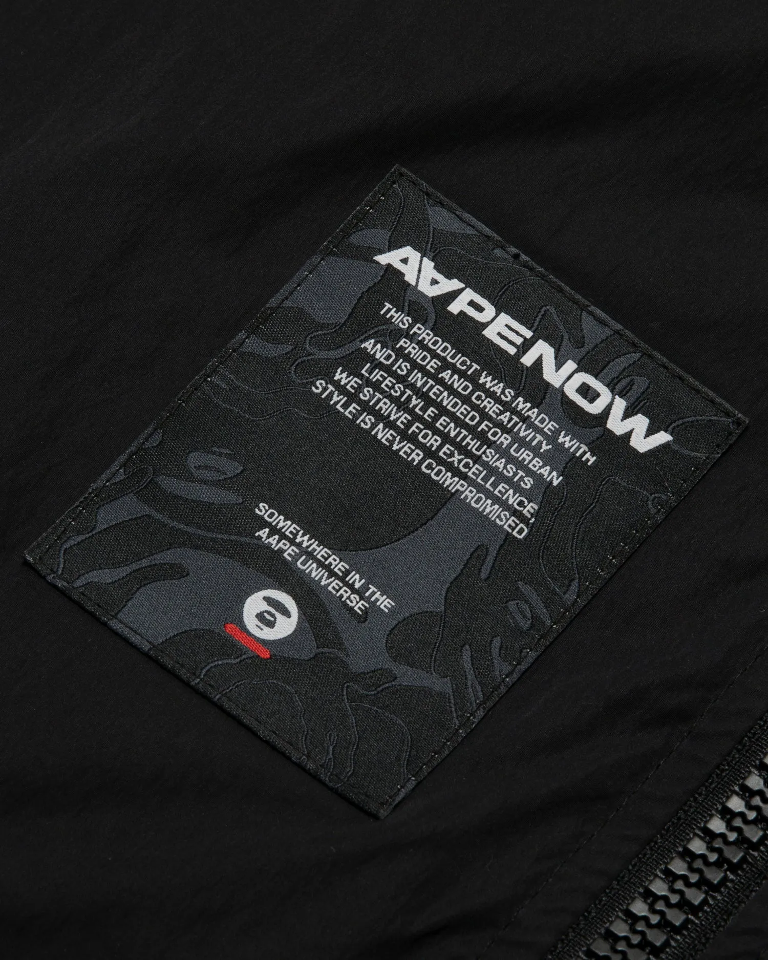 AAPE NOW moonface logo puffer jacket